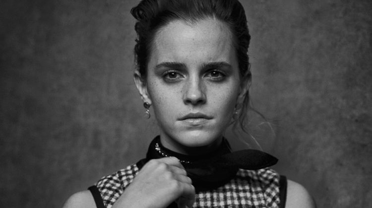 Actress Emma Watson poses in Louis Vuitton dress, Hermes belt and Isabel Marant earrings