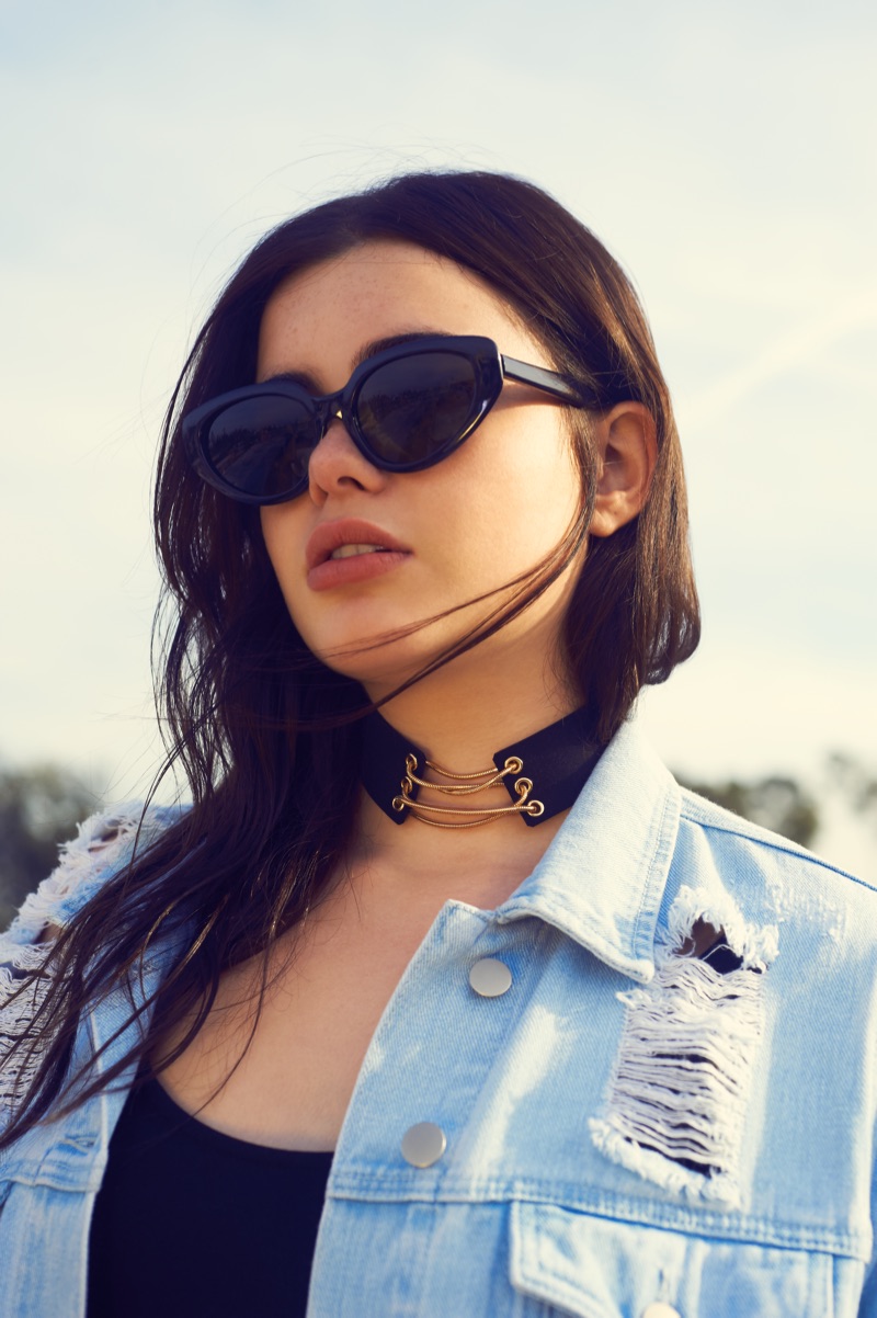 Barbie Ferreira models cat eye sunglasses and denim jacket from Forever 21 Plus' spring 2017 collection