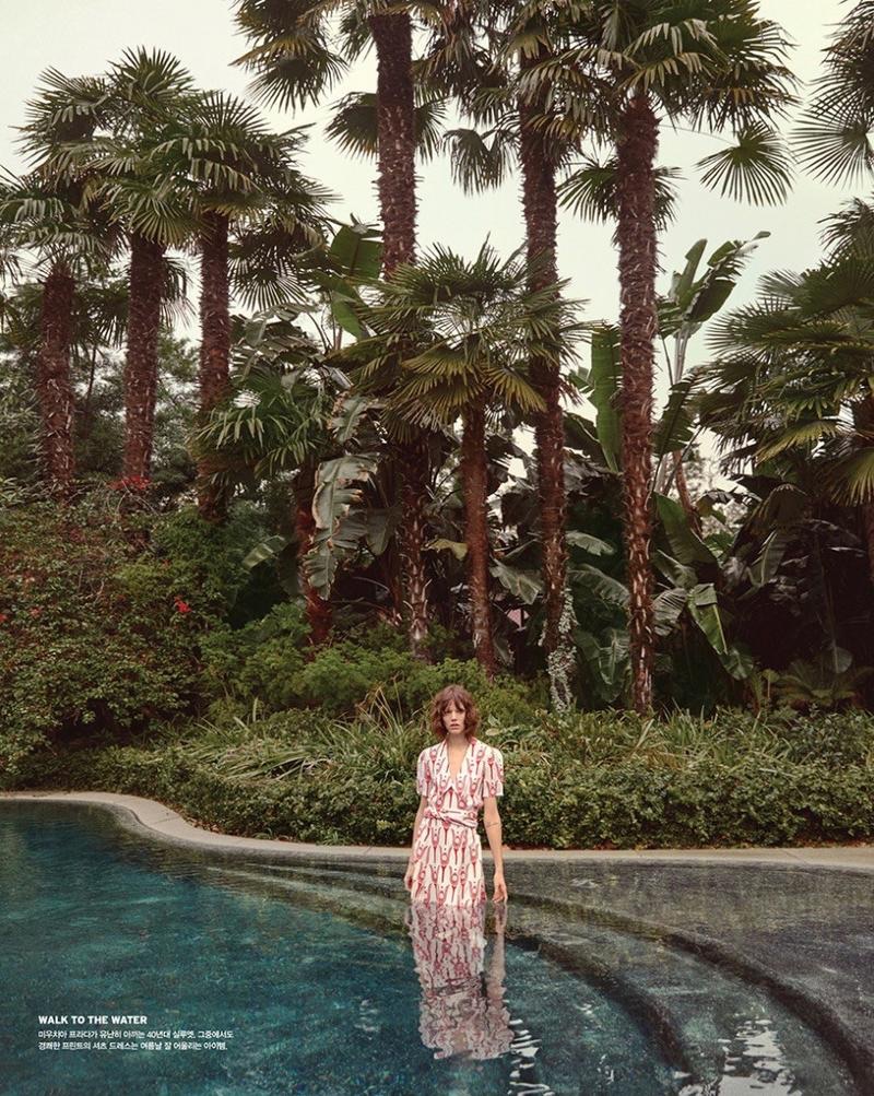  Taking a dip in the pool, Freja Beha Erichsen models printed Miu Miu dress