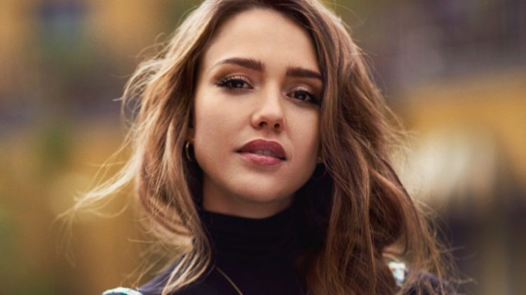 Actress Jessica Alba poses in Prada turtleneck printed top and briefs