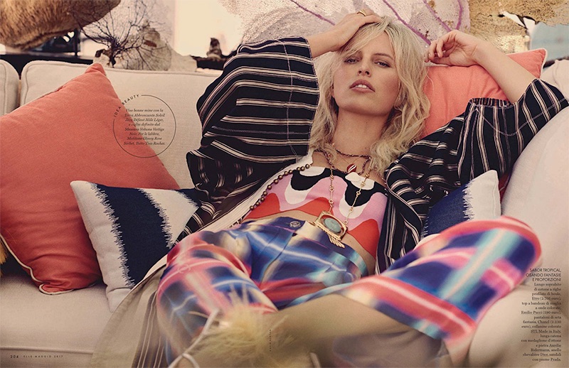 Lounging in style, Karolina Kurkova models Etro overcoat with Emilio Pucci bandeau top and Chanel silk pants