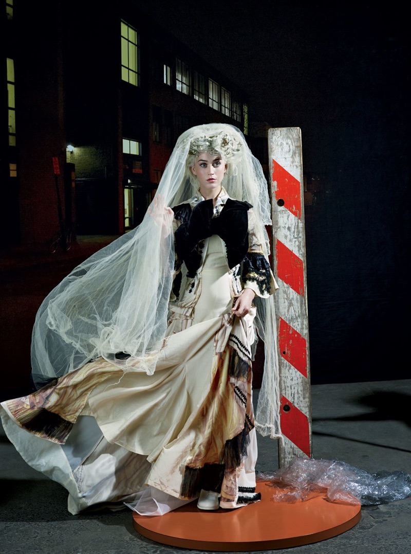 Singer Katy Perry gets covered up in a wedding veil with Comme des Garçons look