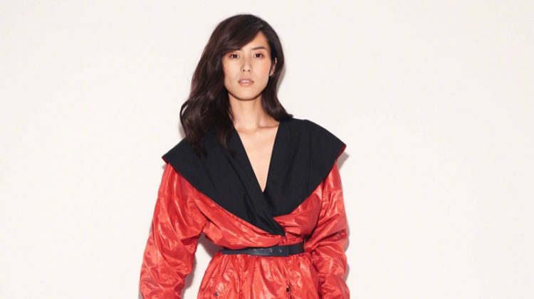 Channeling the 1980's Liu Wen gets wrapped up in red coat