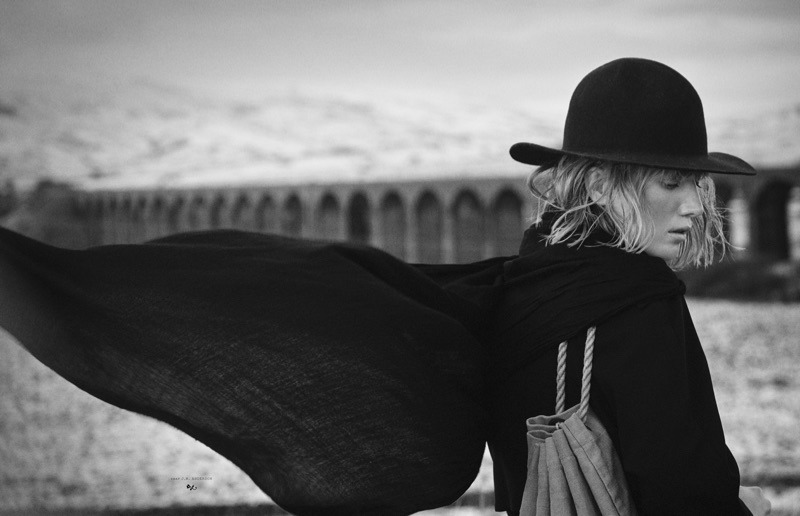 Catching the breeze, Lou Schoof wears J.W. Anderson coat