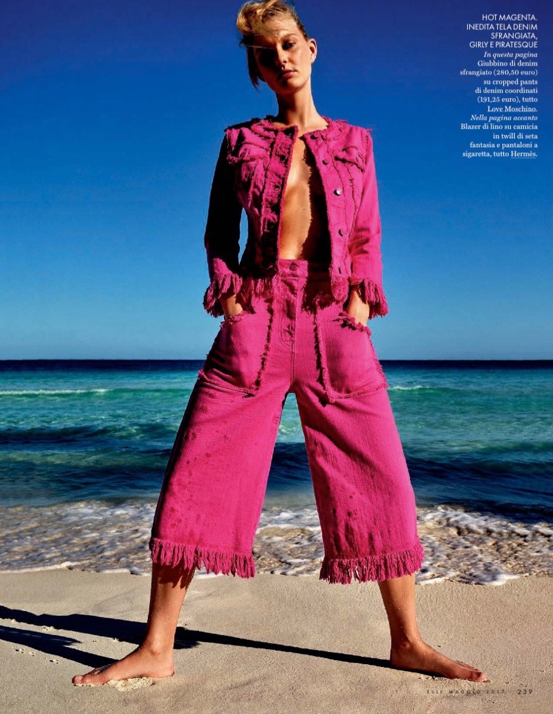 Patricia van der Vliet poses in Love Moschino denim fringed jacket and matching cropped pants