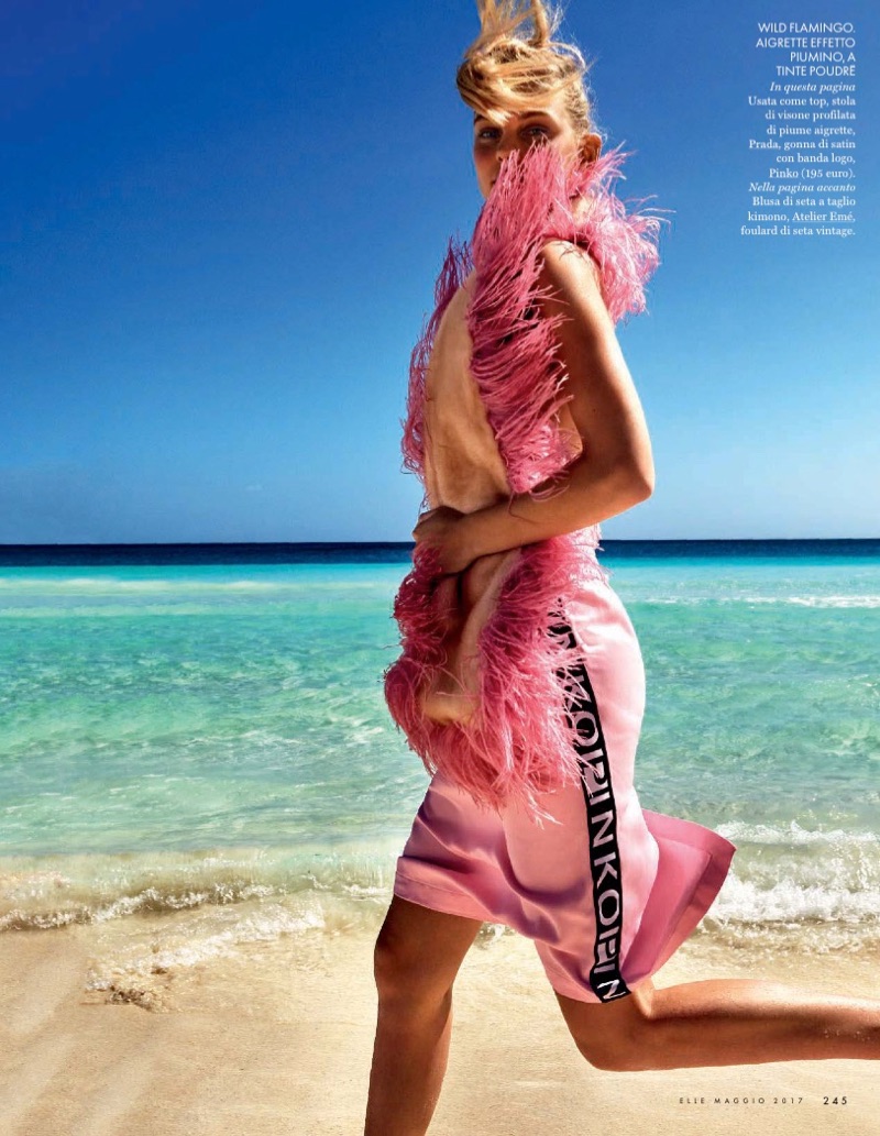 Model Patricia van der Vliet poses in Prada skirt (worn as top) and stole with Pinko skirt