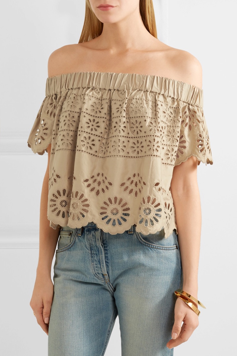 An off-the-shoulder top made of broderie anglaise is a warm weather essential