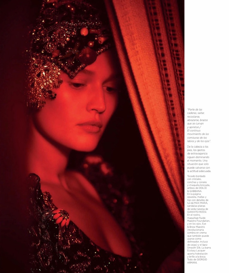 Toni Garrn poses in embroidered headdress and brocade jacket from Dolce & Gabbana