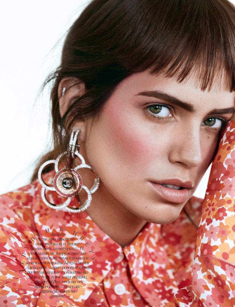 Amanda Wellsh poses in Michael Kors Collection floral print shirt and Chanel earrings