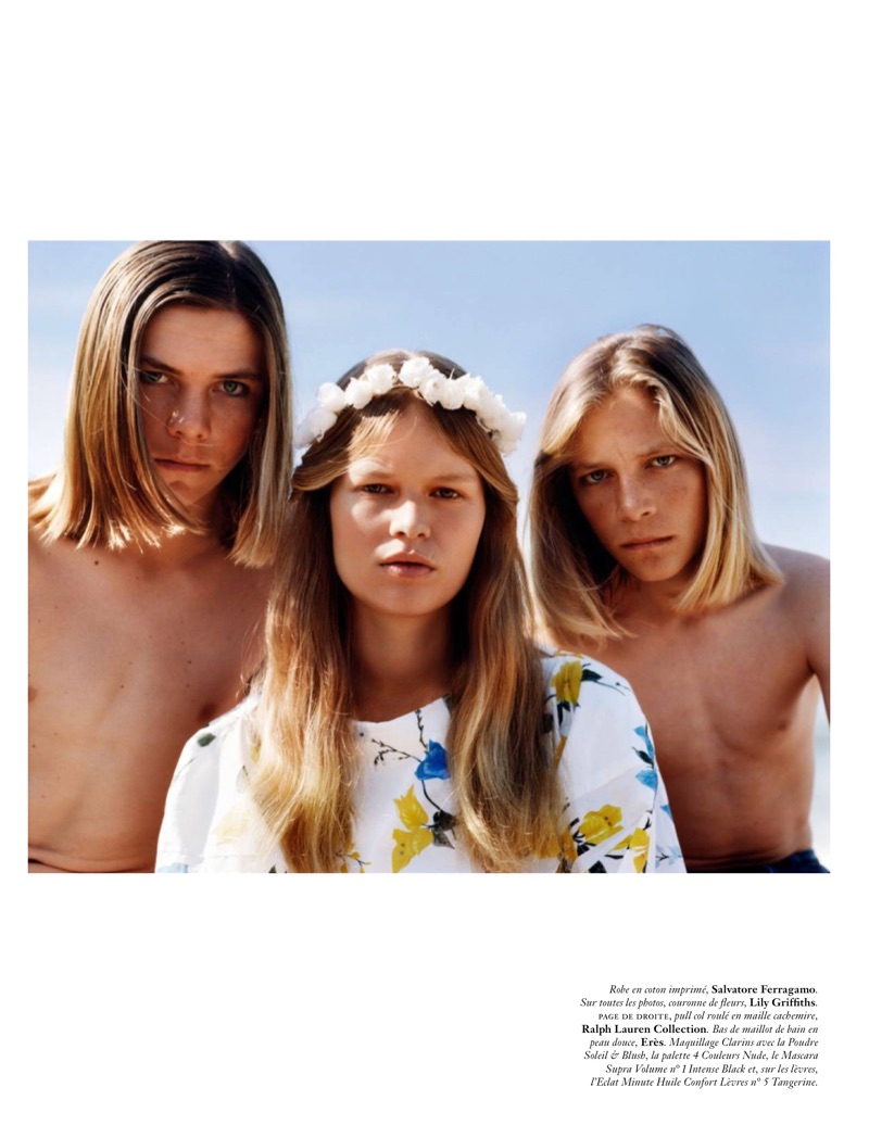 Posing with skateboarders, Anna Ewers models Salvatore Ferragamo printed cotton dress