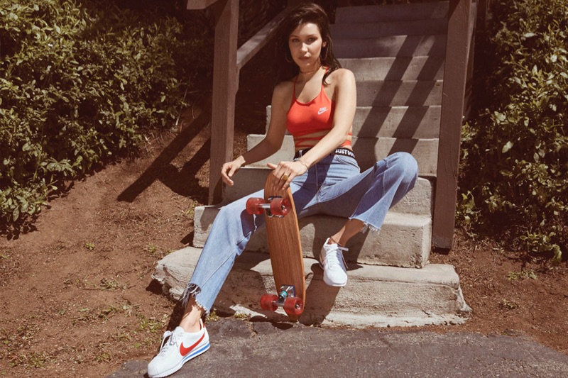 Looking like Farrah Fawcett, Bella Hadid appears in Nike Cortez campaign