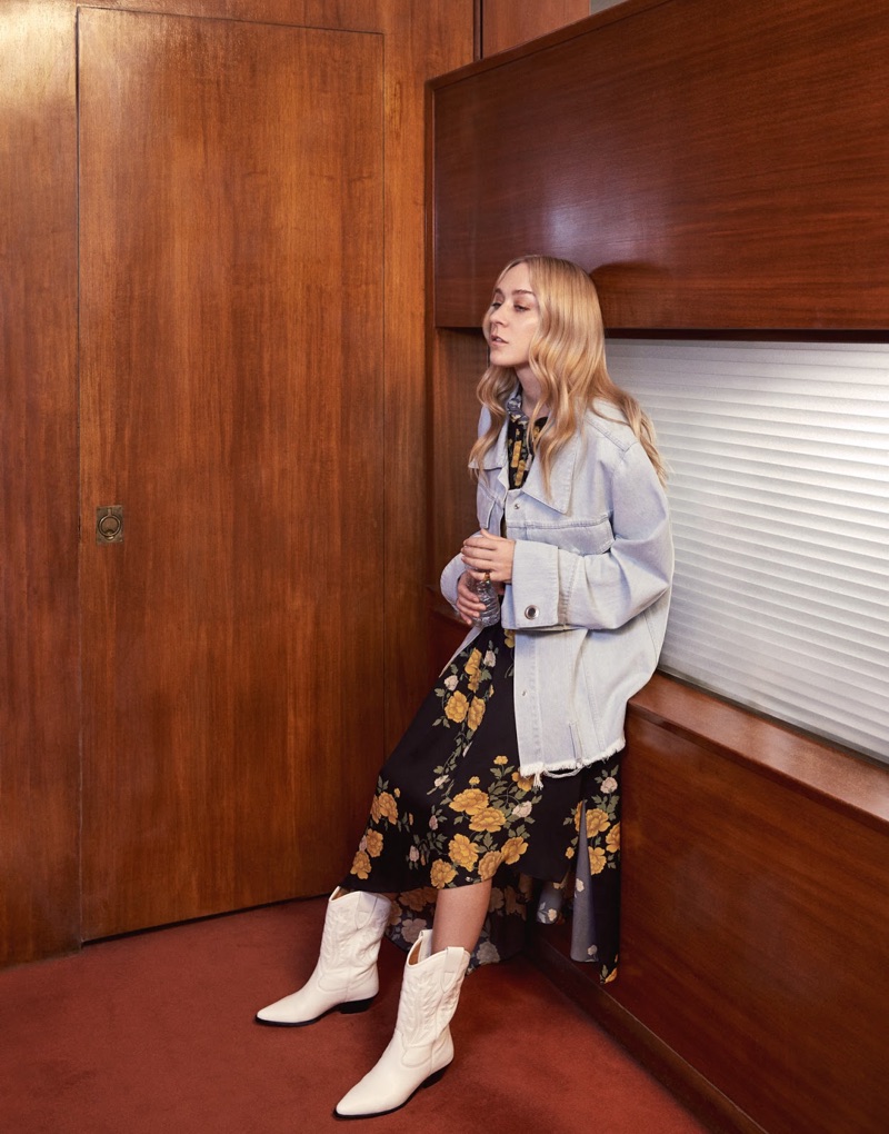 Actress Chloe Sevigny wears Gucci Jacket, Magda Butrym dress and Isabel Marant boots