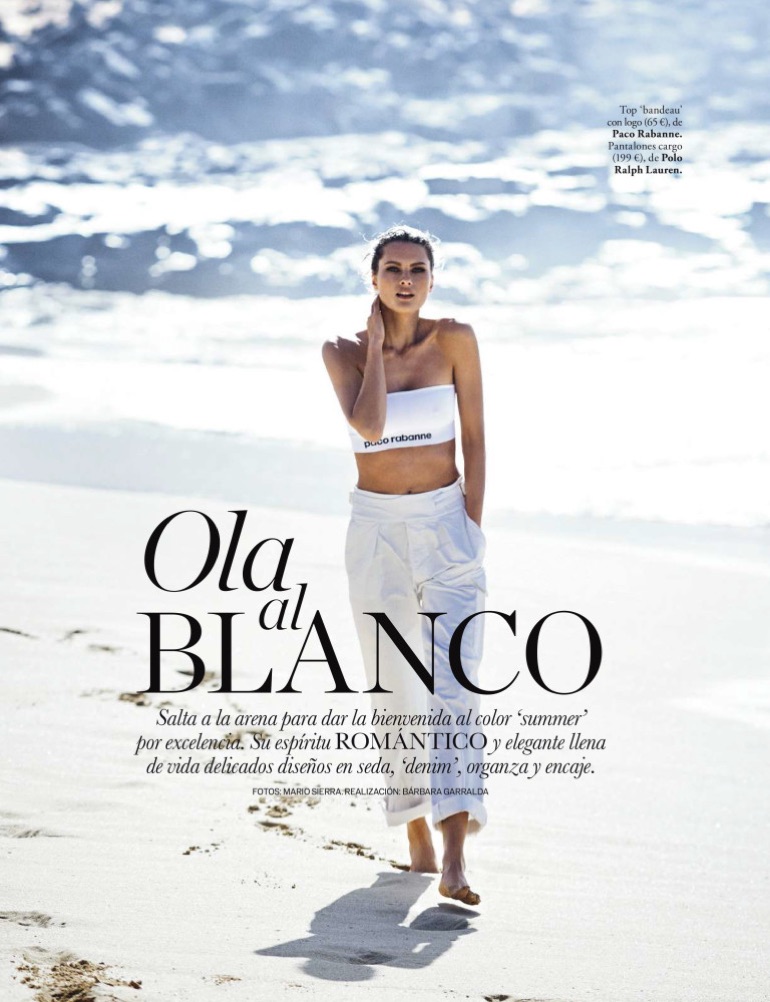 Posing at the beach, Elena Melnik wears Paco Rabanne bandeau top and Polo Ralph Lauren cargo pants