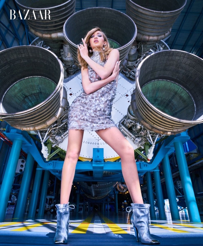 Flaunting serious leg, Gigi Hadid models Miu Miu dress and Tom Ford booties