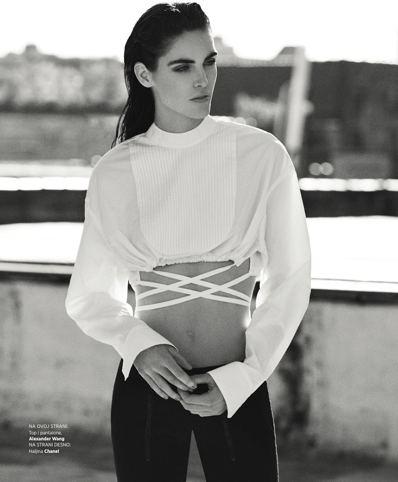 Photographed in black and white, Hilary Rhoda models Alexander Wang crop top and pants