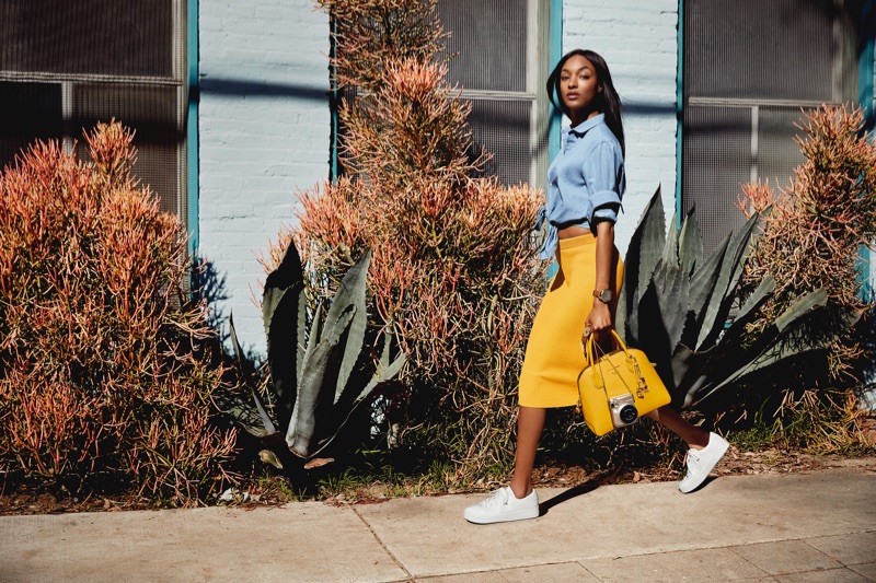 Model Jourdan Dunn poses with Mercer dome satchel bag from Michael Kors