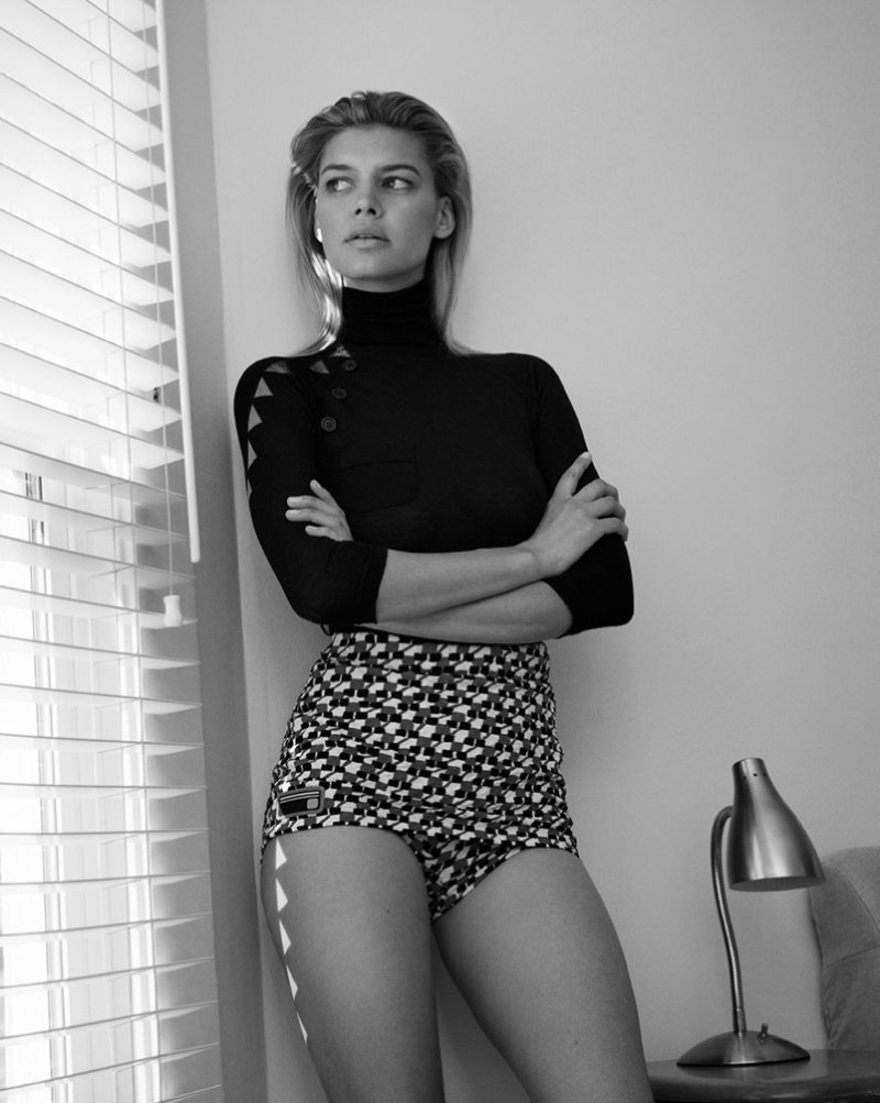 Model Kelly Rohrbach poses in Prada turtleneck and briefs