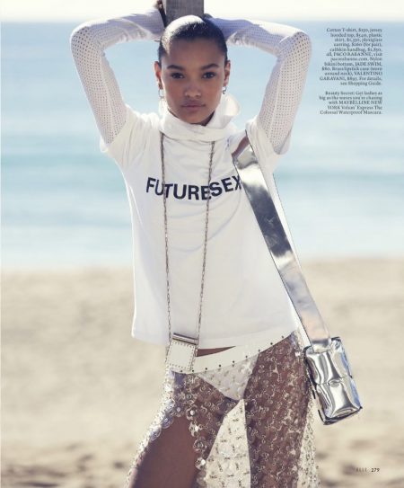 Lameka Fox Wears Chic Beach Styles for ELLE Lameka Fox poses in Paco Rabanne t-shirt, hooded top, plastic skirt, earrings and handbag