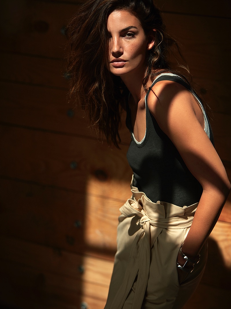 Keeping it casual, Lily Aldridge models sleeveless top and high-waisted trousers