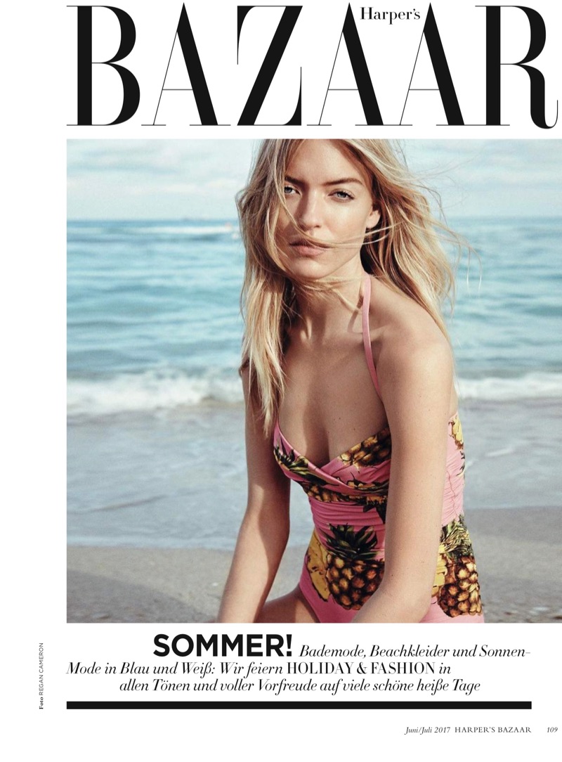 Model Martha Hunt poses in printed swimsuit