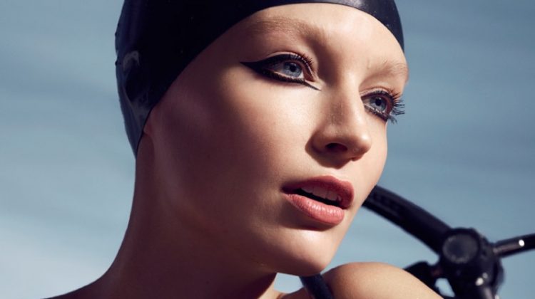 Model Melissa Tammerijn poses in scuba-ready beauty looks for the spread