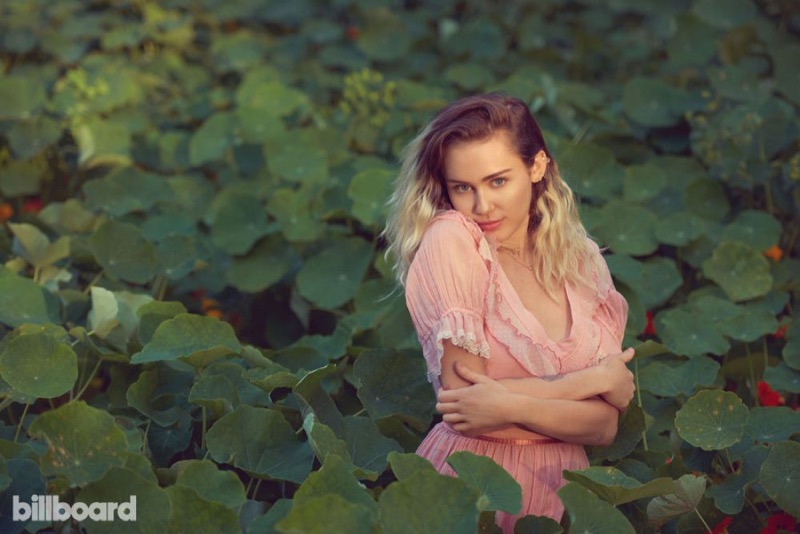 Singer Miley Cyrus looks pretty in pink for Billboard Magazine