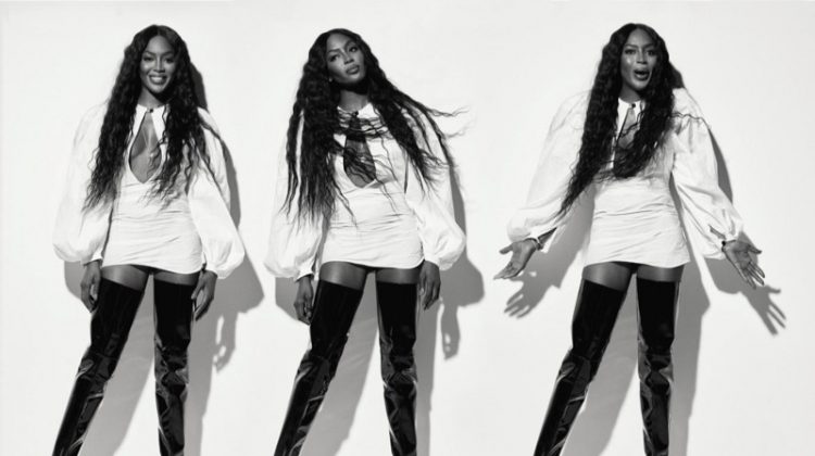 Supermodel Naomi Campbell poses in Jacquemus blouse and Ellery thigh high boots