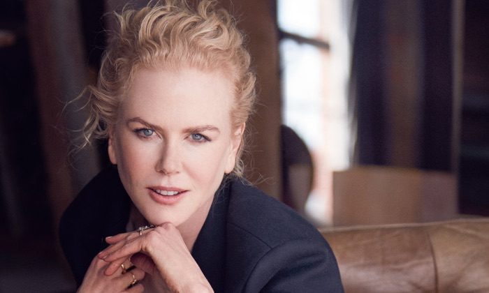 Actress Nicole Kidman poses in fitted blazer