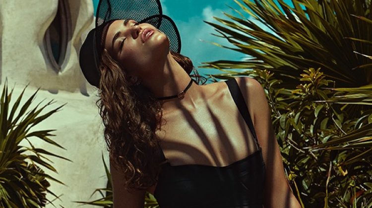 Robin Marjolein models Max Mara bodysuit and Dior visor