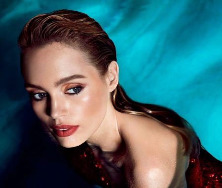 Staz Lindes Models Summer Beauty Looks in Allure Wearing a red lip color, Staz Lindes dives into summer beauty