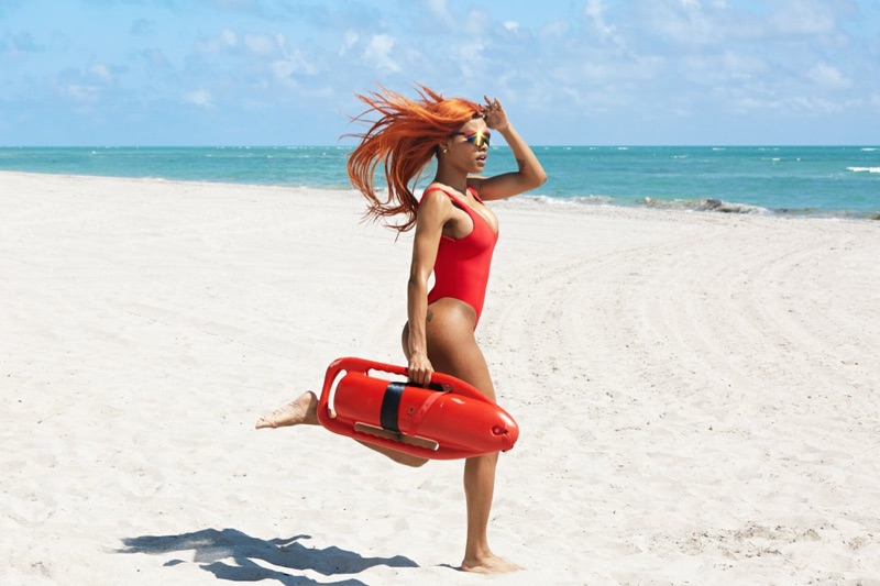 Teyana Taylor runs on the beach in Swimsuits For All Baywatch campaign