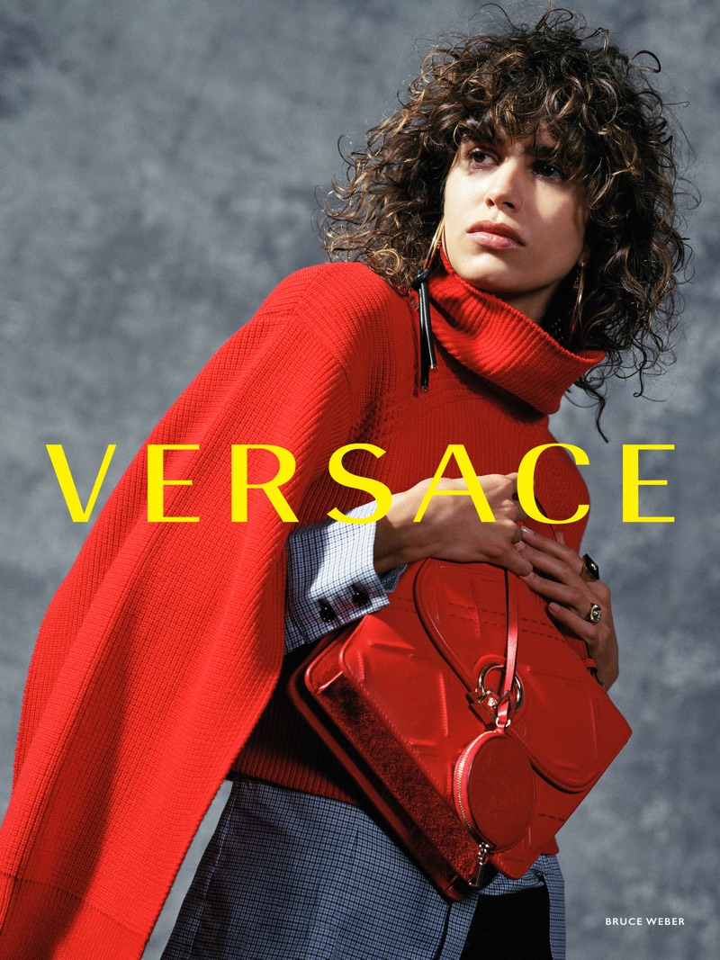 Mica Arganaraz sports a red look in Versace's fall-winter 2017 campaign