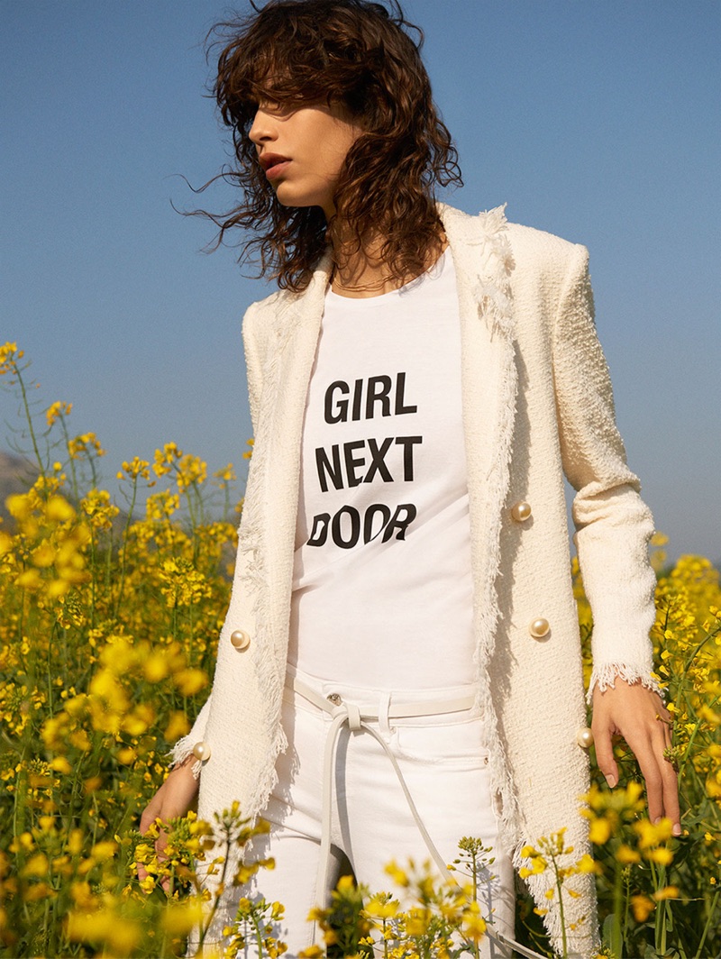 Mica Arganaraz models Zara textured jacket, white t-shirt and white denim pants
