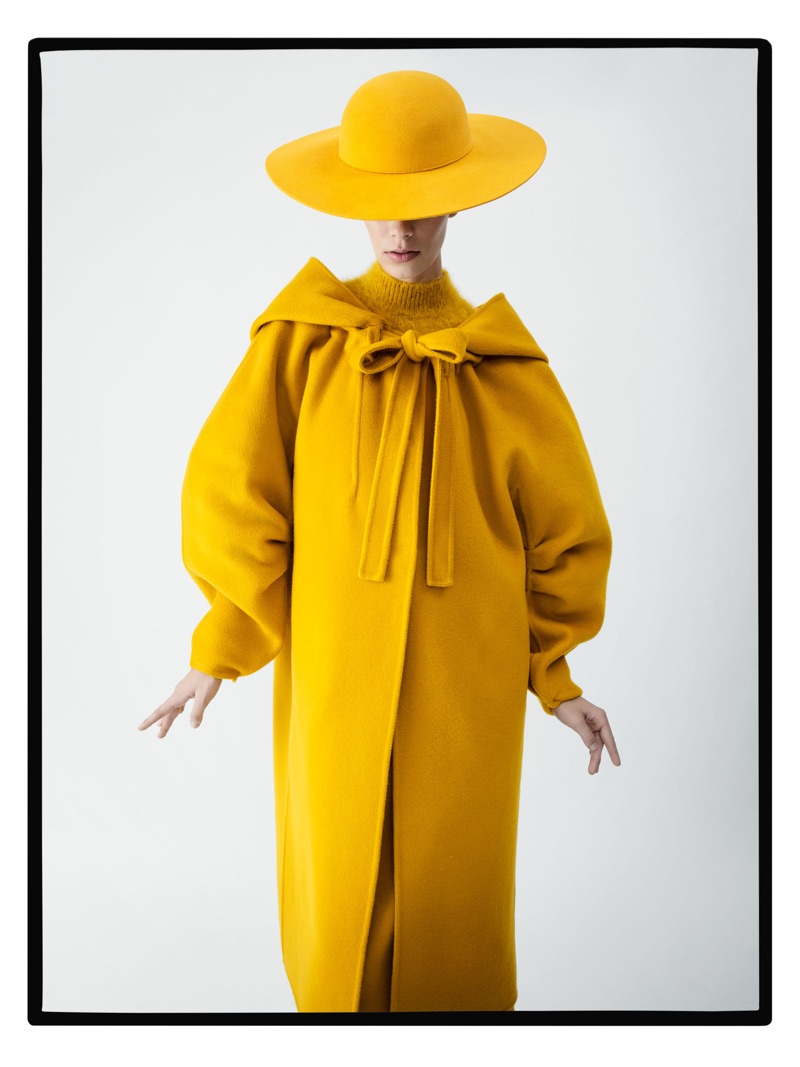 Lexi Boling models yellow hat and coat in Alberta Ferretti’s fall 2017 campaign