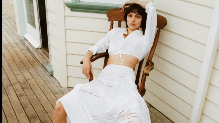 Charlee Fraser wears Alaia cotton-poplin shirt, Alaia cotton maxi skirt and Ancient Greek Sandals leather sandals