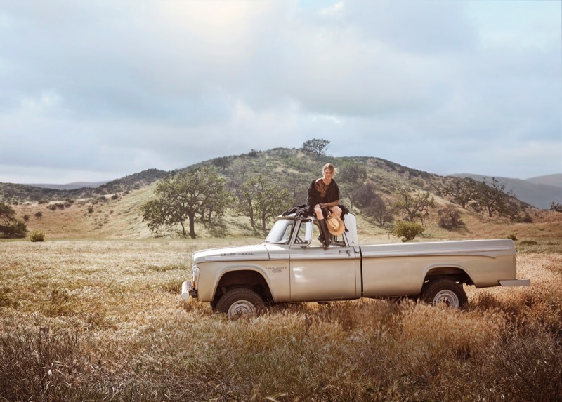 Chrissy Teigen poses outdoors in the fashion shoot