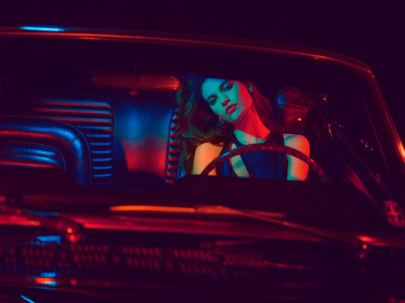 Posing in a car, Lily James goes for a ride