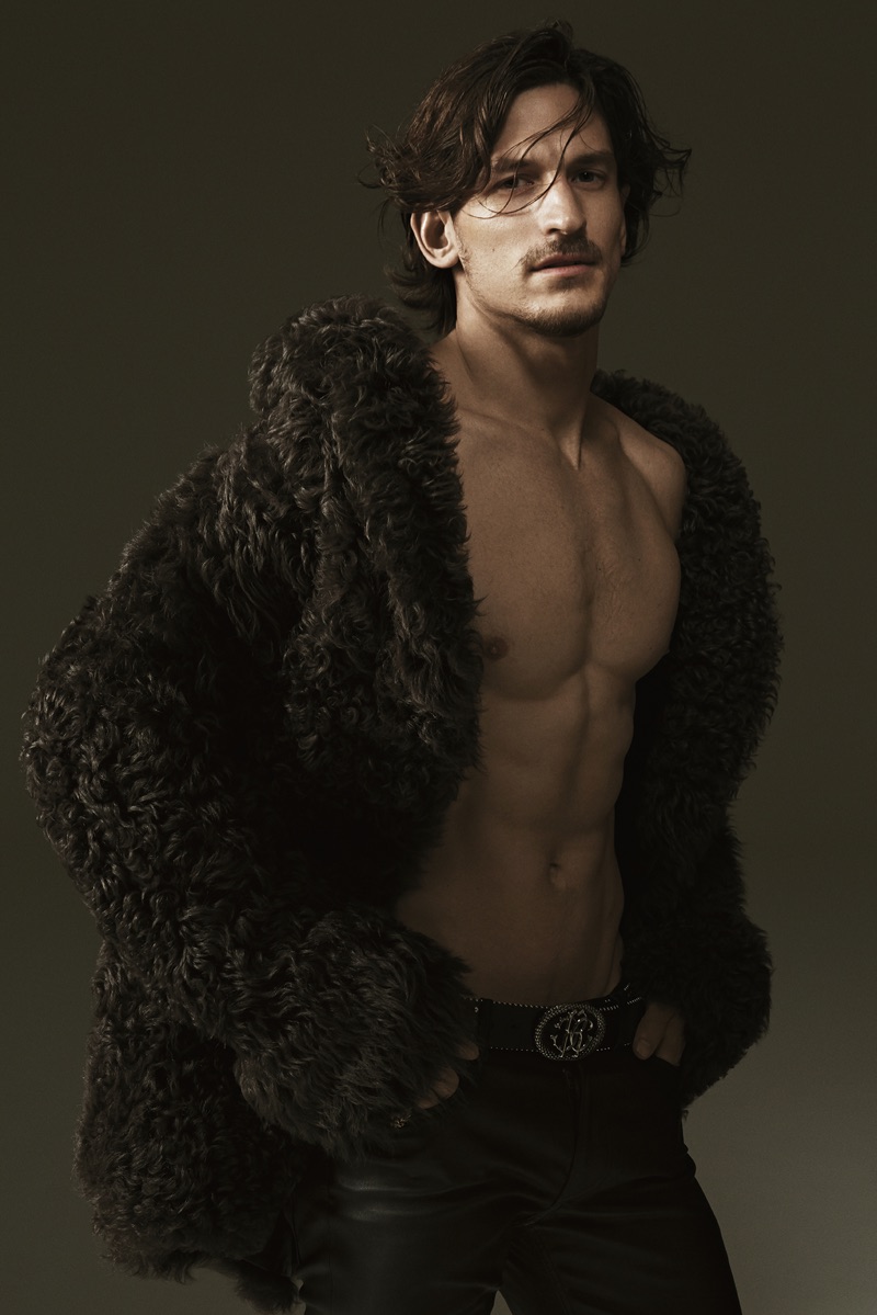 Jarrod Scott wears a fur coat in Roberto Cavalli's fall-winter 2017 campaign