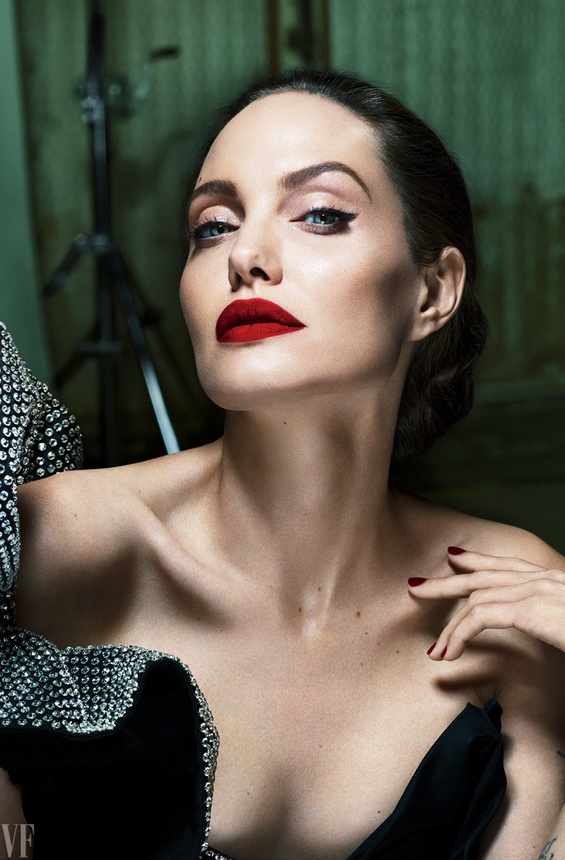 Angelina Jolie stuns with dark red lipstick