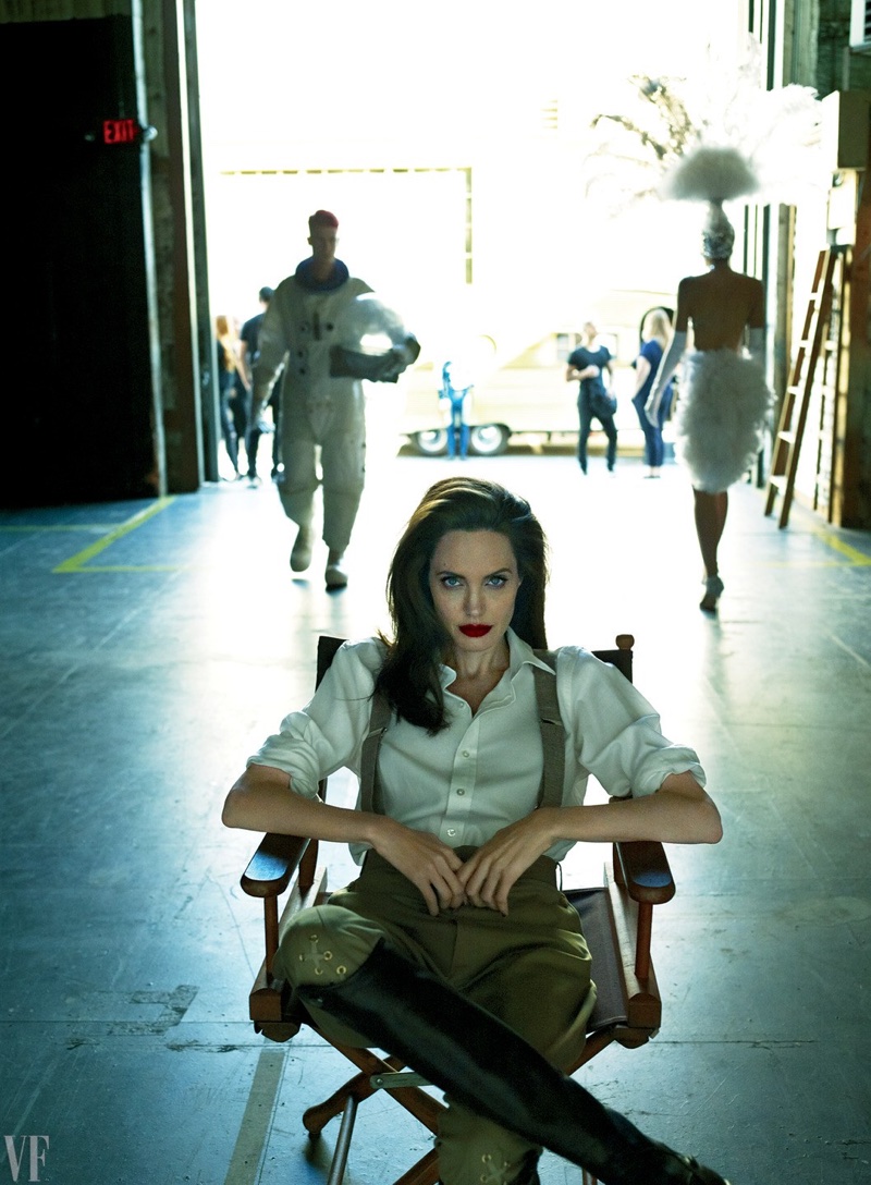 Taking the director's seat, Angelina Jolie looks chic in suspenders and shirting