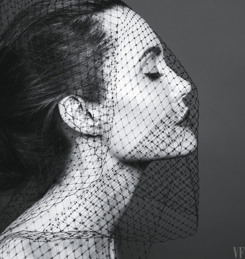 Getting her closeup, Angelina Jolie wears mesh veil