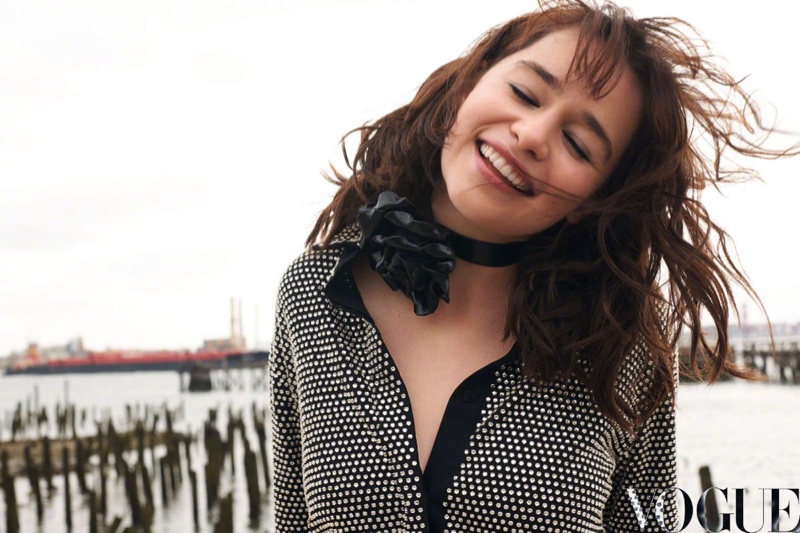 Emilia Clarke flashes a smile in this photograph