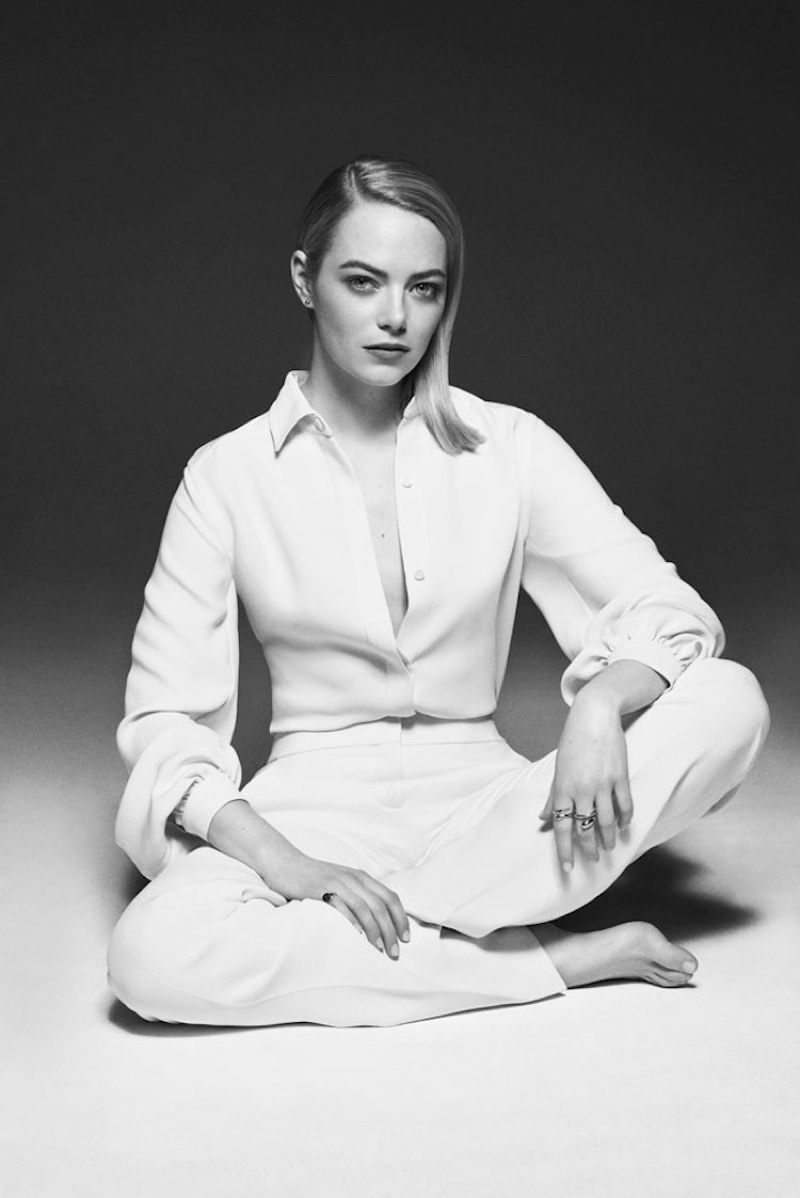 Actress Emma Stone poses in Tom Ford top and pants