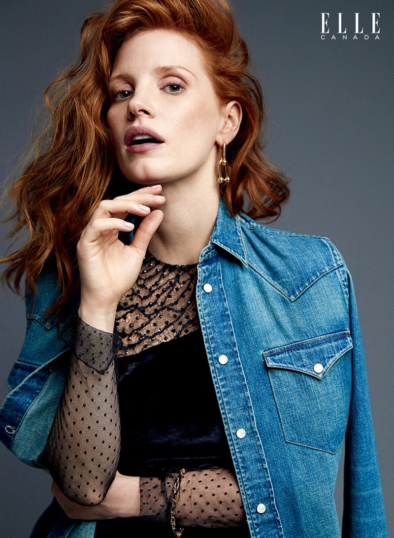 Actress Jessica Chastain poses in Ralph Lauren Collection denim shirt, Jason Wu dress and Tiffany & Co. jewelry