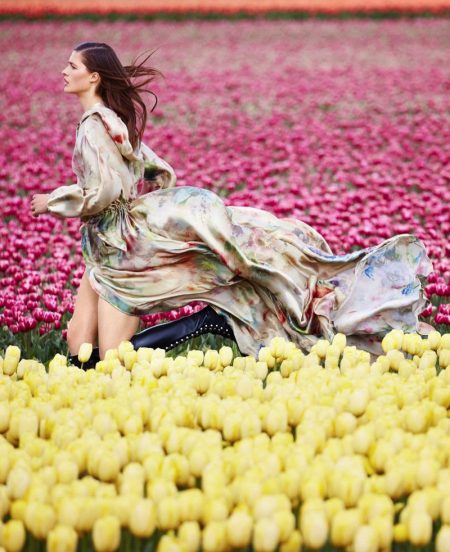 Julia Van Os Poses in Vibrant Blooms for Harper's Bazaar