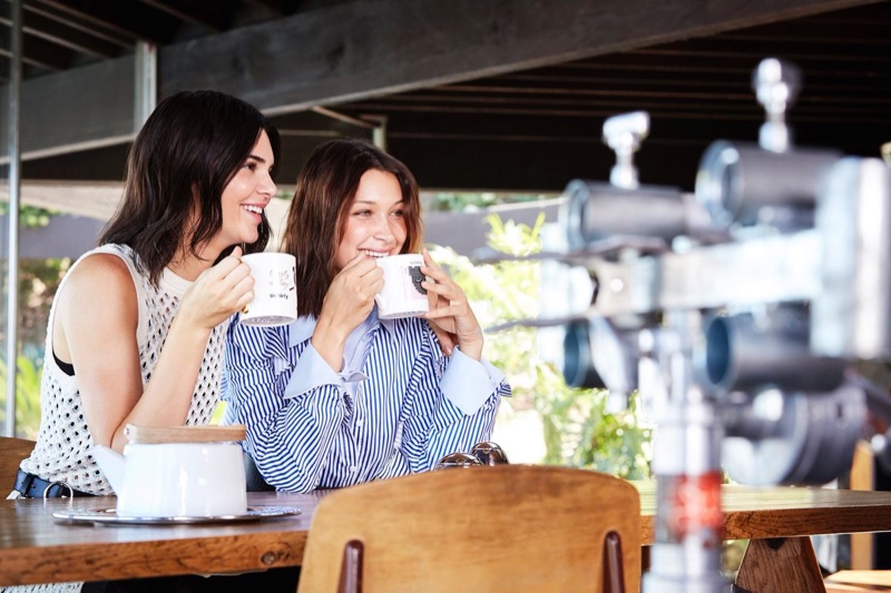 Bella Hadid and Kendall Jenner share a cup behind the scenes on Ochirly campaign