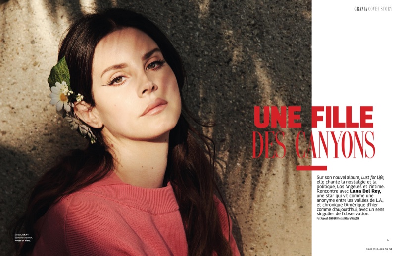 Photographed by Hilary Walsh, Lana Del Rey wears DKNY sweater