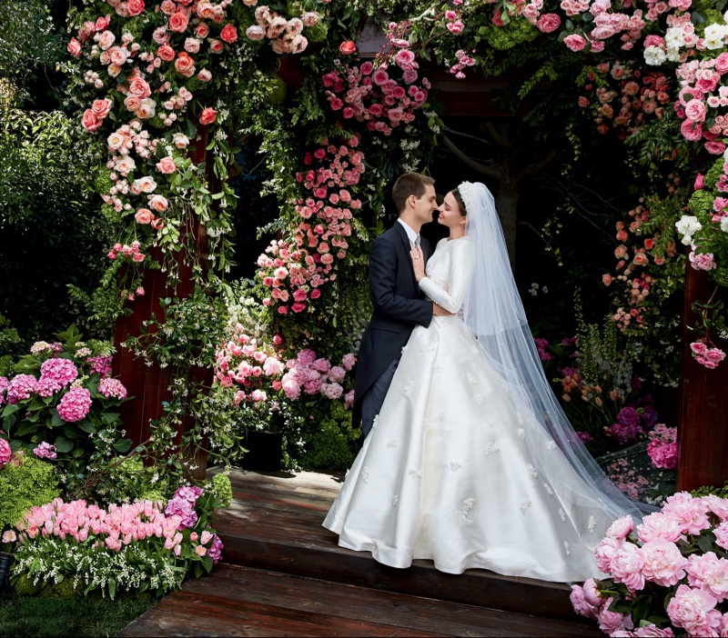 Miranda Kerr shares a kiss with husband Evan Spiegel. Photo: Vogue/Patrick Demarchelier