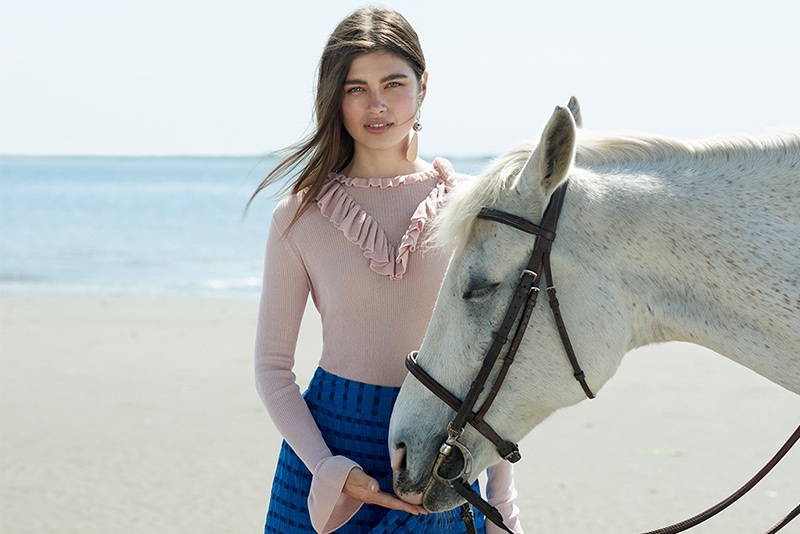 Ulla Johnson Maritza Pullover and Gretchen Skirt. Elizabeth and James Tulum Earrings.