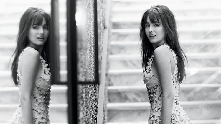 Photographed in black and white, Camilla Belle wears Zimmermann dress